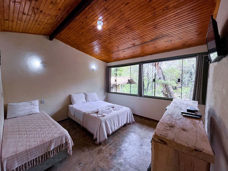 Suíte Tripla com Vista para a Natureza