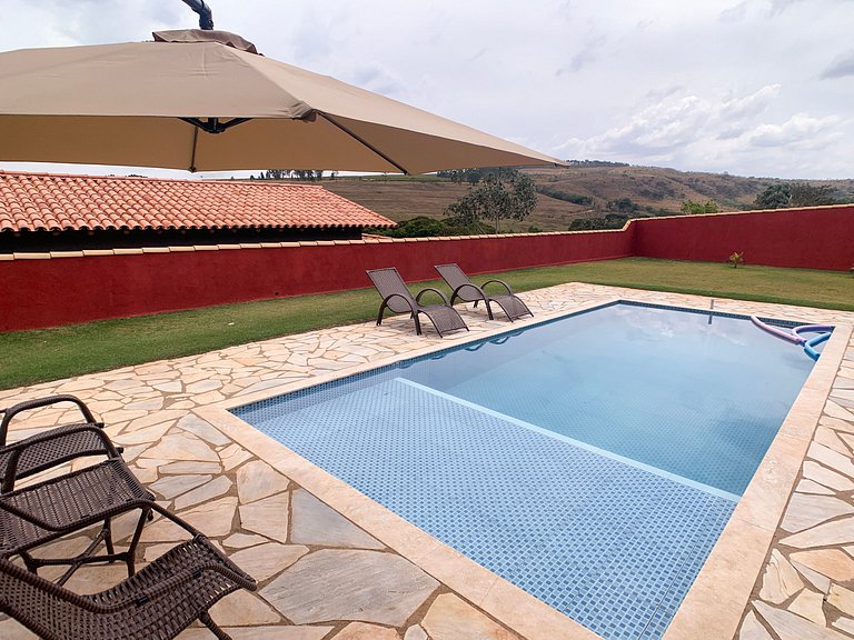Casa em Capitólio, com piscina e área gourmet